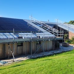 SOLAREDGE PANELS ON STANDING SEAM ROOF.
